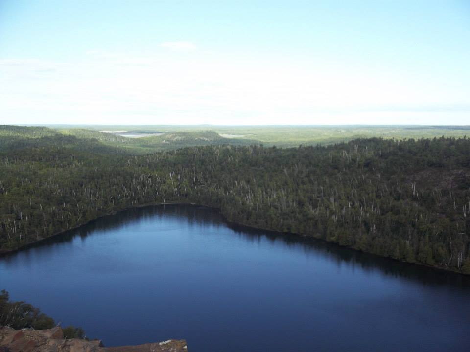 A picture of a lake from an overlook.