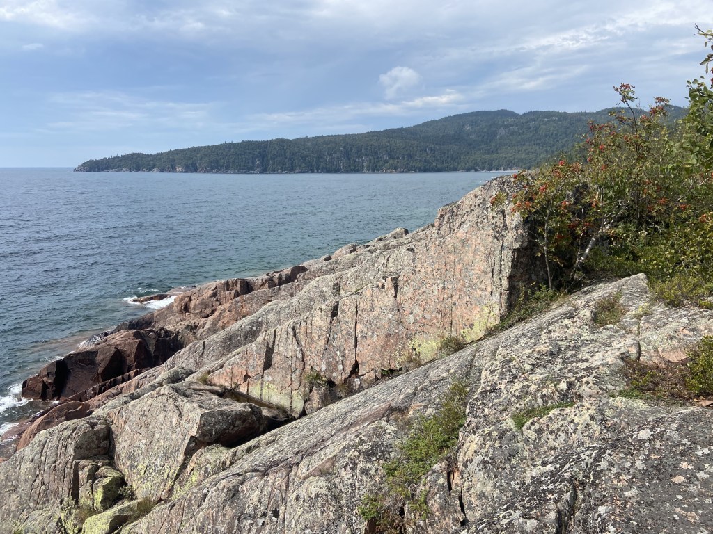 Angled rocks jutting into Lake Superior